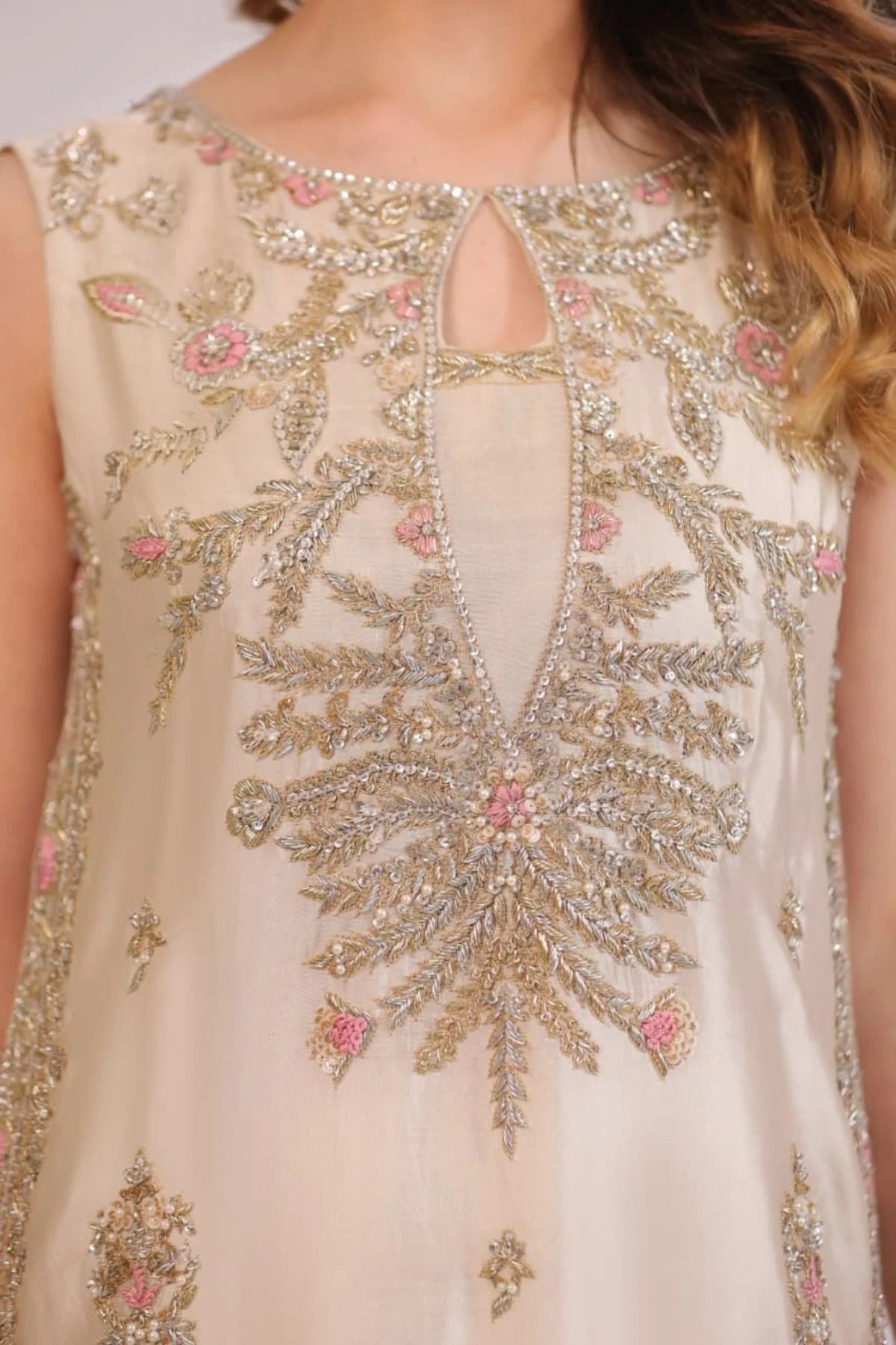 Ivory Bloom Pakistani fashion outfit in ivory, gold tones.